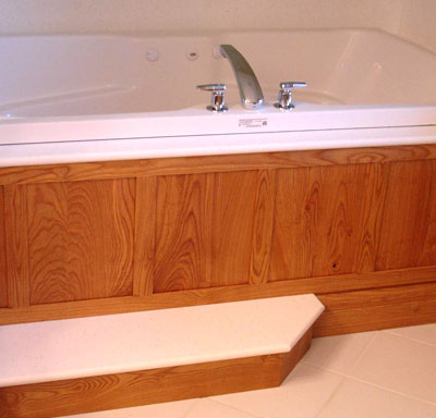 Wood bath vanity and tub surround